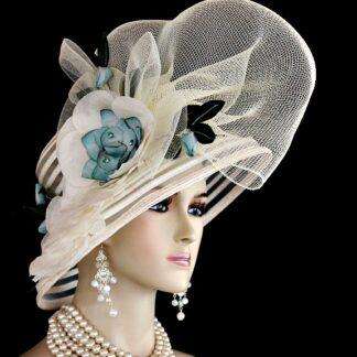 <META NAME="DESCRIPTION" CONTENT="Ladies Ivory Tea Blue Wide Sheer Brimmed Designer Hat Kentucky Derby Dress Hats With Flowers By NY Fashion Hats. We specialize in Church hats