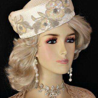 <META NAME="DESCRIPTION" CONTENT="Ivory Designer Pillbox Wedding Hat By Women's Designer Hats. We specialize in Church hats