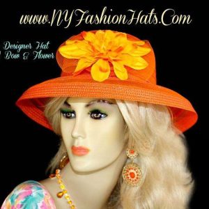 <META NAME="DESCRIPTION" CONTENT="Orange Designer Kentucky Derby Wedding Hat With A Flower Fashion Hats. We Sell sheer orange wedding hats for women