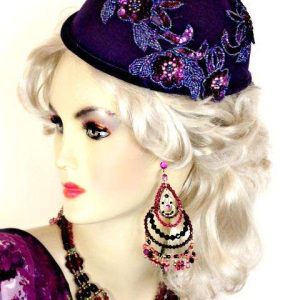 <META NAME='Ladies Purple Custom Made Designer Fashion Flapper Cocktail Hat. This Dress Hat Is Custom Made By Women's Designer Hats. We Specialize In Wedding Hats