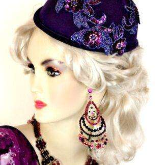 <META NAME='Ladies Purple Custom Made Designer Fashion Flapper Cocktail Hat. This Dress Hat Is Custom Made By Women's Designer Hats. We Specialize In Wedding Hats