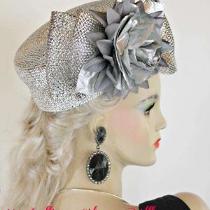 <META NAME="DESCRIPTION" CONTENT="Metallic Silver Cocktail Pillbox Hat For Women. This Dress Hat Is Custom Made By Women's Designer Hats. We Specialize In Wedding Hats