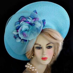 <META NAME='Turquoise Blue Haute Couture High Fashion Designer Hat With Flowers. This Dress Hat Is Custom Made By Women's Designer Hats. We Specialize In Wedding Hats
