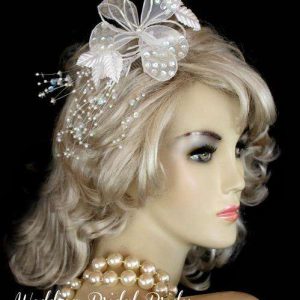 <META NAME="DESCRIPTION" CONTENT="Ladies Ivory Bridal Wedding Hair Comb Headpiece